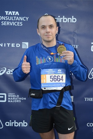 Happy Egor with his well-deserved medal